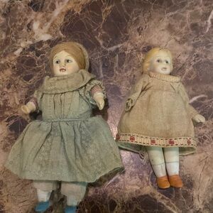 Two miniature vintage dollhouse bisque dolls